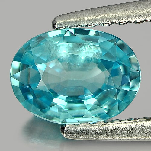 Natural Blue Zircon Gemstones 1.05 Ct. Oval Shape 7 x 5.2 Mm.: Product ID: 807715383 Product Name: Natural Zircon Weight: 1.05 CT. Size: 7 x 5.2 x 2.9 MM. Shape: Oval Color: Blue Clarity:SI Luster: Good Gems Origin: Cambodia Treatment: Heated Crystal Structure: T
