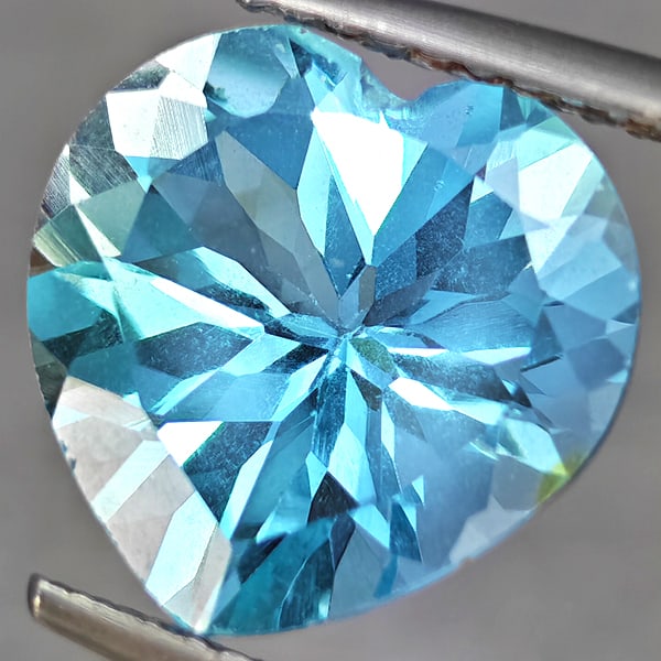 Natural Baby Blue Topaz Gemstones 3.27 Ct. Heart Shape 11 Mm.: Product ID: 807168765 Product Name: Natural Blue Topaz Weight: 3.27 CT. Size: 11 x 11 x 6.8 MM. Shape: Heart Shape Color: Baby Blue Clarity:VSI Luster: Good Gems Origin: Brazil Treatment: Treated Crys