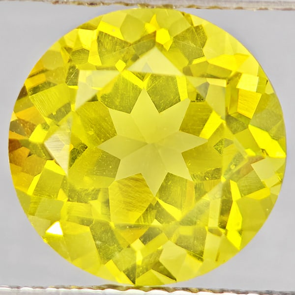 Natural Yellow Lemon Quartz Gemstones 3.90 Ct. Round Shape 10.1 Mm.: Product ID: 805530206 Product Name: Natural Quartz Weight: 3.90 CT. Size: 10.1 x 10.1 x 7.3 MM. Shape: Round Shape Color: Yellow Lemon Clarity:VSI Luster: Good Gems Origin: Brazil Treatment: Unheated 