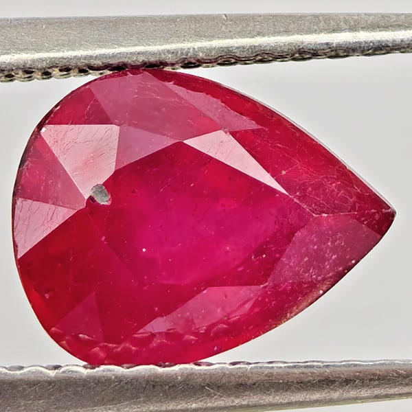 Natural Purplish Red Ruby Gemstones 2.29 Ct. Pear Shape 9 x 7 Mm.: Product ID: 805935566 Product Name: Natural Ruby Weight: 2.29 CT. Size: 9 x 7 x 4.9 MM. Shape: Pear Shape Color: Purplish Pink Clarity:VSI - SI1 Luster: Good Gems Origin: Madagascar Treatment: Heated 
