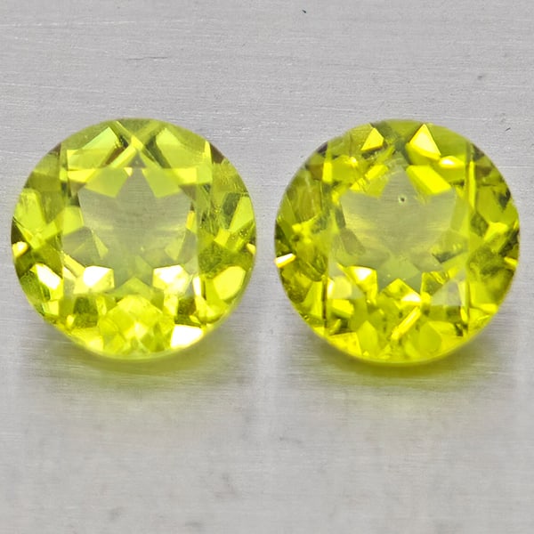 Natural Green Peridot Gemstones 1.65 Ct. 2 Pcs. Round Shape 5.9 Mm.: Product ID: 805317505 Product Name: Natural Rhodolite Weight: 1.65 CT. Size: 5.9 x 5.9 x 3.4 MM. Shape: Round Color: Green Clarity:VSI Luster: Good Gems Origin: Pakistan Treatment: Unheated Crystal St