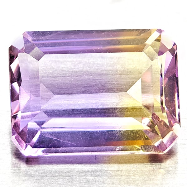 Natural Bi Color Ametrine Gemstones 2.28 Ct. Octagon Shape 9.3 x 7 Mm.: Product ID: 800408486 Product Name: Natural Ametrine Weight: 2.28 CT. Size: 9.3 x 7 x 4.4 MM. Shape: Octagon Color: Bi Color Clarity:VSI Luster: Good Gems Origin: Bolivia Treatment: Unheated Crystal S