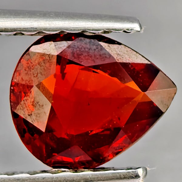 Natural Orangish Red Spessartine Garnet Gemstones 0.81 Ct. Pear Shape 6.6 x 5.6 Mm.: Product ID: 802937347 Product Name: Natural Garnet Weight: 0.81 CT. Size: 6.6 x 5.6 x 2.6 MM. Shape: Pear Shape Color: Orangish Red Clarity:SI1 Luster: Good Gems Origin: Namibia Treatment: Unheated Cr