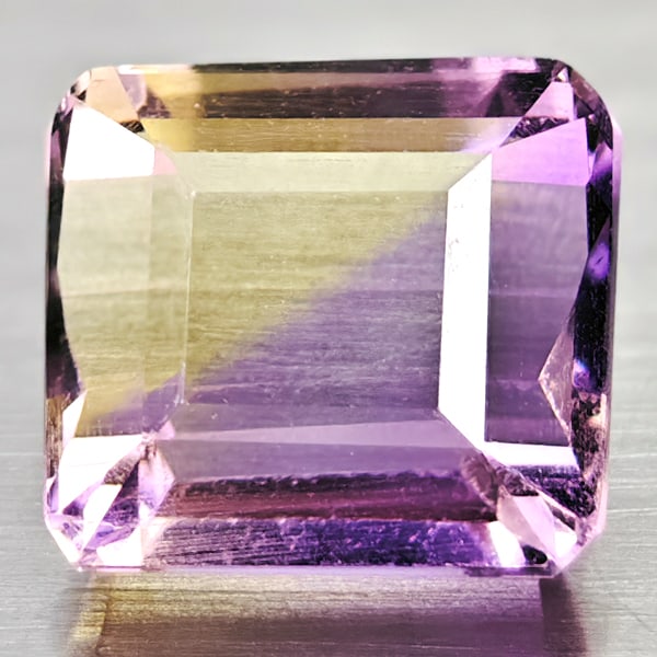 Natural Bi- Color Ametrine Gemstones 2.40 Ct. Octagon Shape 7.7 x 7.1 Mm.: Product ID: 100400887 Product Name: Natural Ametrine Weight: 2.40 CT. Size: 7.7 x 7.1 x 5.6 MM. Shape: Octagon Color: Bi Color Clarity:IF Luster: Good Gems Origin: Barzil Treatment: Unhedted Crystal S