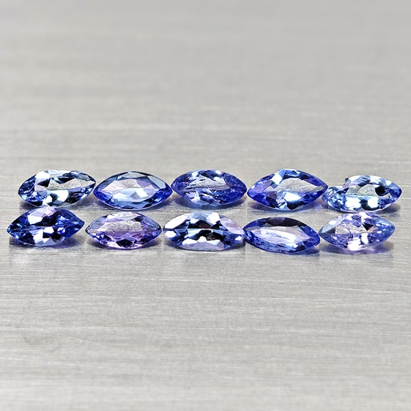 Natural Blue Tanzanite Gemstones 1.28 Ct. 10 Pcs. Marquise Shape 5.2 x 2.7 Mm.: Product ID: 807015033 Product Name: Natural Tanzanite Weight: 1.28 CT. Size: 5.2 x 2.7 x 1.5 MM. Shape: Marquise Shape Color: Violetish Blue Clarity:VSI Luster: Good Gems Origin: Tanzania Treatment: H