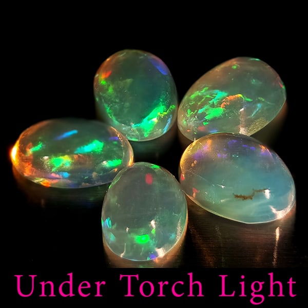 Natural Multi Color Opal Gemstones 1.41 Ct. 5 Pcs Oval Cabochon Shape 6.1 x 4.3 Mm.: Product ID: 818728093 Product Name: Natural Opal Weight: 1.41 CT. Size: 6.1 x 4.3 x 2.5 MM. Shape: Oval Cabochon Color: Multi-Color Clarity:Semi - Transparent Luster: Good Gems Origin: Ethiopia Treatm