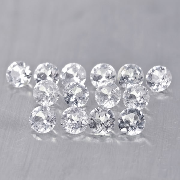 Natural White Topaz Gemstones 3.93 Ct. 14 Pcs. Round Shape 4 Mm.: Product ID: 807167601 Product Name: Natural Topaz Weight: 3.93 CT. Size: 4 x 4 x 2.5 MM. Shape: Round Color: White Clarity:VSI - SI1 Luster: Good Gems Origin: Brazil Treatment: Unheated Crystal Struct