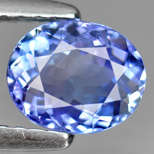 Natural Violetish Blue Tanzanite Gemstones 1.08 Ct. Oval Shape 7.01 x 5.71 Mm.: Product ID: 807005316 Product Name: Natural Tanzanite Weight: 1.08 CT. Size: 7.01 x 5.71 x 3.55 MM. Shape: Oval Color: Blue Clarity:VSI Luster: Good Gems Origin: Tanzania Treatment: Heated Crystal Str