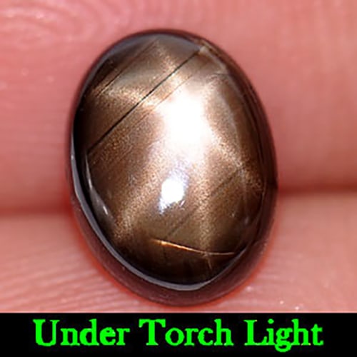 Natural Black Star Sapphire Gemstones 6 Rays 2.20 Ct. Oval Cabochon Shape 8.3 x 6.2 Mm.: Product ID: 806151738 Product Name: Natural Star Sapphire Weight: 2.20 CT. Size: 8.3 x 6.2 x 3.5 MM. Shape: Oval Cabochon Color: Black Clarity:Opaque Luster: Good Gems Origin: Thailand Treatment: Unhe