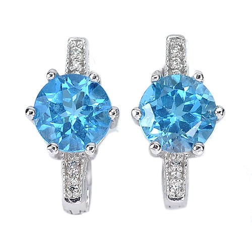 Natural Swiss Blue Topaz Gemstones 925 Sterling Silver Earrings Jewelry 4.12 Grams: Product ID: 281020136 Product Name: Natural Fashion Jewelry Weight: 4.12 CT. Size: 15.6 x 8.5 Mm. MM. Shape: Round Color: Blue Clarity:VVS Luster: Good Gems Origin: Thailand Treatment: Treated Crystal