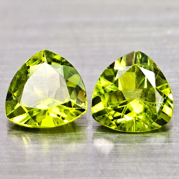 Natural Green Peridot Gemstones 1.31 Ct. 2 Pcs. Trilliant Shape 5.9 Mm.: Product ID: 805317071 Product Name: Natural Peridot Weight: 1.31 CT. Size: 5.9 x 5.9 x 3.2 MM. Shape: Trilliant Color: Green Clarity:VSI Luster: Good Gems Origin: Pakistan Treatment: Unheated Crystal 