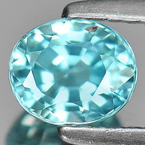 Natural Blue Zircon Gemstones 1.39 Ct. Oval Shape 6.2 x 5.2 Mm.: Product ID: 807717048 Product Name: Natural Zircon Weight: 1.39 CT. Size: 6.2 x 5.2 x 4 MM. Shape: Oval Color: Blue Clarity:VSI Luster: Good Gems Origin: Cambodia Treatment: Heated Crystal Structure: 