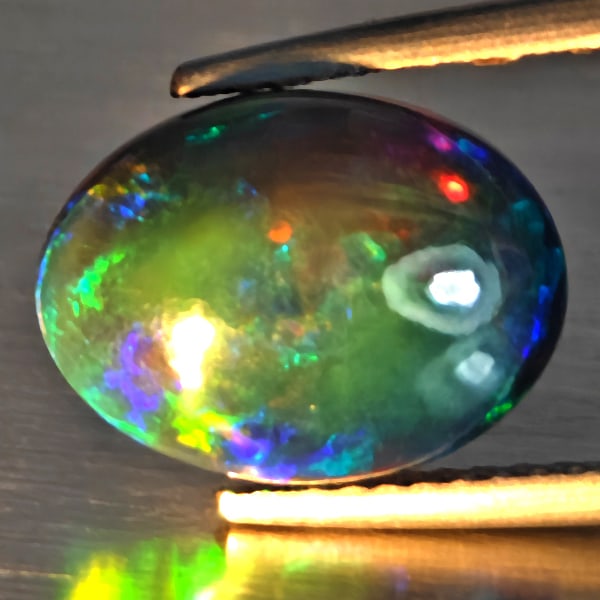 Natural Multi Color Play Of Color Rainbow Opal Gemstones 2.83 Ct. Oval Cabochon Shape 12.2 x 9.2 Mm. (1 of 3)