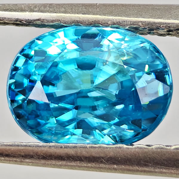 Natural Blue Zircon Gemstones 2.27 Ct. Oval Shape 7.6 x 5.8 Mm.: Product ID: 807743017 Product Name: Natural Zircon Weight: 2.27 CT. Size: 7.6 x 5.8 x 5.1 MM. Shape: Oval Color: Blue Clarity:VSI - SI1 Luster: Good Gems Origin: Cambodia Treatment: Heated Crystal Str