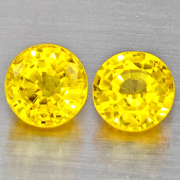 Natural Yellow Sapphire Gemstones 0.67 Ct. 2 Pcs. Round Shape 3.9 Mm.: Product ID: 806162925 Product Name: Natural Yellow Sapphire Weight: 0.67 CT. Size: 3.9 x 3.9 x 2.6 MM. Shape: Round Shape Color: Yellow Clarity:VSI Luster: Good Gems Origin: Thailand Treatment: Heated
