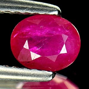 Natural Purplish Pink Ruby Gemstones 0.70 Ct. Oval Shape 6.1 x 5 Mm.: Product ID: 805927048 Product Name: Natural Ruby Weight: 0.70 CT. Size: 6.1 x 5 x 2.6 MM. Shape: Oval Color: Purplish Pink Clarity:VSI Luster: Good Gems Origin: Tanzania Treatment: Heated (Lead-glass 