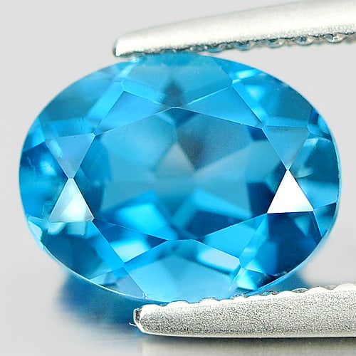 Natural London Blue Topaz Gemstones 2.21 Ct. Oval Shape 9 x 7.1 Mm.: Product ID: 807161000 Product Name: Natural Blue Topaz Weight: 2.21 CT. Size: 9 x 7.1 x 4.7 MM. Shape: Oval Color: London Blue Clarity:VSI Luster: Good Gems Origin: Brazil Treatment: Treated Crystal S