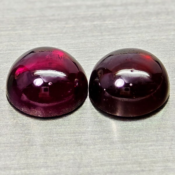 Natural Purplish Pink Rhodolite Garnet Gemstones 2.68 Ct. 2 Pcs. Round Cabochon Shape 6.1 Mm.: Product ID: 802936759 Product Name: Natural Rhodolite Weight: 2.68 CT. Size: 6.1 x 6.1 x 3 MM. Shape: Round Cabochon Color: Purplish Pink Clarity:Semi - Transparent Luster: Good Gems Origin: Madagasca