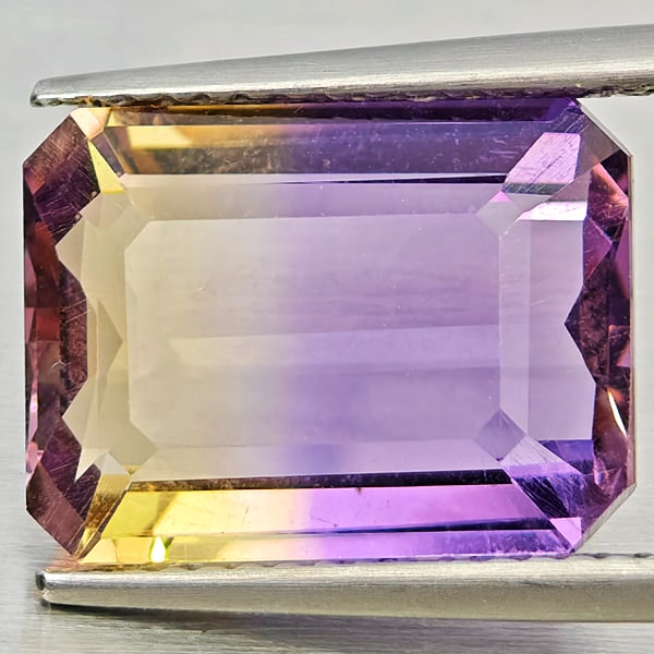 Natural Bi Color Ametrine Gemstones 6.06 Ct. Octagon Shape 13.3 x 9.9 Mm.: Product ID: 800408641 Product Name: Natural Ametrine Weight: 6.06 CT. Size: 13.3 x 9.9 x 5.8 MM. Shape: Octagon Color: Bi Color Clarity:VSI Luster: Good Gems Origin: Bolivia Treatment: Unheated Crysta