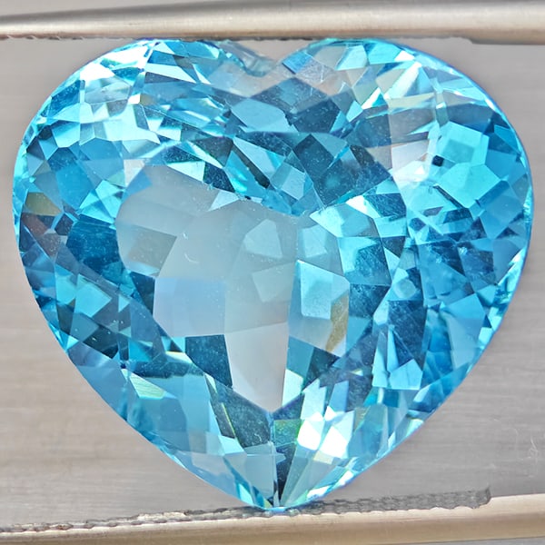 Natural Baby Blue Color Topaz Gemstones 25.57 Ct. Heart Shape 18.5 x 17.5 Mm.: Product ID: 807168500 Product Name: Natural Blue Topaz Weight: 25.57 CT. Size: 18.5 x 17.5 x 11.7 MM. Shape: Heart Shape Color: Baby Blue Color Clarity:VVS - VSI Luster: Very Good Gems Origin: Brazil 