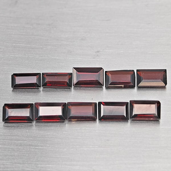 Natural Orangish Red Garnet Gemstones 3.07 Ct. 10 Pcs Baguette Shape 5.2 x 3.2 Mm.: Product ID: 802937880 Product Name: Natural Red Garnet Weight: 3.07 CT. Size: 5.2 x 3.2 x 2.2 MM. Shape: Baguette Shape Color: Orangish Red Clarity:SI1 Luster: Good Gems Origin: Tanzania Treatment: Un