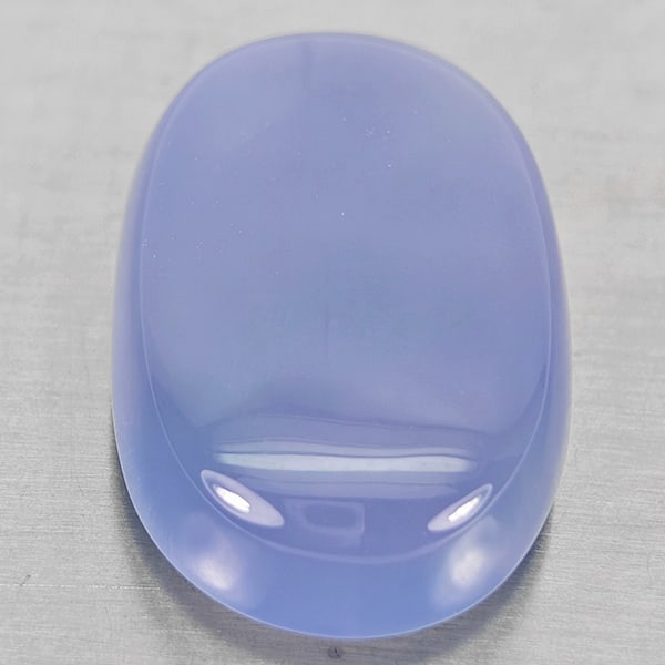 Natural Lavender Chalcedony Gemstones 36.37 Ct. Oval Cabochon Shape 28 x 18 Mm.: Product ID: 801502720 Product Name: Natural Chalcedony Weight: 36.37 CT. Size: 28 x 18 x 18.9 MM. Shape: Oval Cabochon Color: Lavender Clarity:Semi - Transparent Luster: Good Gems Origin: Russia Treat