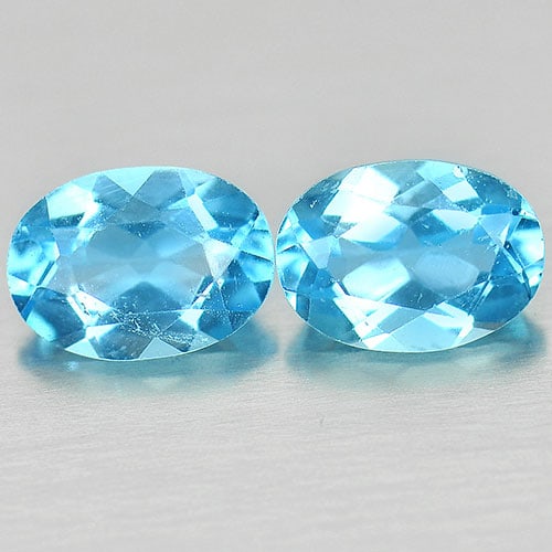 Natural Swiss Blue Topaz 1.90 Ct. 2 Pcs. Oval Shape 7.1 x 5.1 Mm.: Product ID: 807164002 Product Name: Natural Blue Topaz Weight: 1.90 CT. Size: 7.1 x 5.1 x 3.4 MM. Shape: Oval Color: Swiss Blue Clarity:VSI Luster: Good Gems Origin: Brazil Treatment: Heated Crystal S