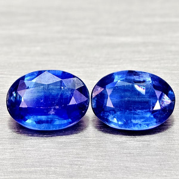 Natural Blue Kyanite Gemstones 1.92 Ct. 2 Pcs. Oval Shape 7 x 5.1 Mm.: Product ID: 804204809 Product Name: Natural Kyanite Weight: 1.92 CT. Size: 7 x 5.1 x 2.9 MM. Shape: Oval Color: Blue Clarity:SI1 Luster: Good Gems Origin: Sri - Lanka Treatment: Unheated Crystal Struc