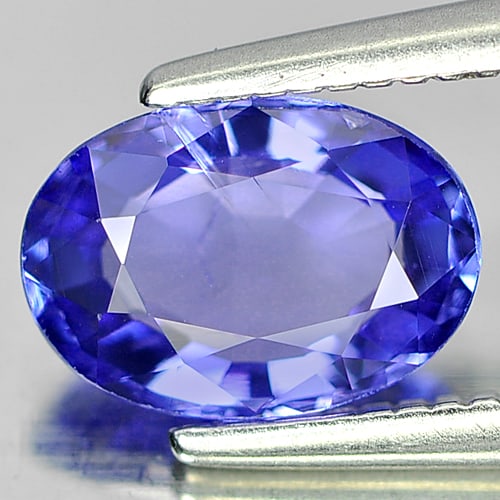 Natural Blue Tanzanite Gemstones 1.03 Ct. Oval Shape 7.7 x 5.5 Mm.: Product ID: 807006540 Product Name: Natural Tanzanite Weight: 1.03 CT. Size: 7.7 x 5.5 x 3 MM. Shape: Oval Color: Violetish Blue Clarity:SI Luster: Good Gems Origin: Tanzania Treatment: Heated Crystal