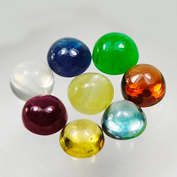 Natural All Mix Gemstone 1.55 Ct. 8 Pcs. Mix Shape Round Cabochon 3.4 to 3.1 Mm.: Product ID: 806161859 Product Name: Natural Fancy Color Sapphire Weight: 1.55 CT. Size: 3.4 to 3.1 MM. Shape: Round Cabochon Color: All Mix Color Clarity:semi transparant Luster: Good Gems Origin: Tan