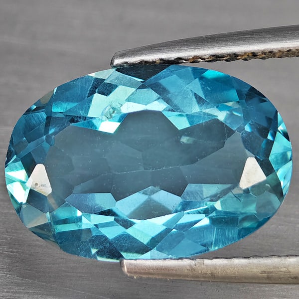 Natural Baby Blue Topaz Gemstones 5.62 Ct. Oval Shape 14 x 9.5 Mm.: Product ID: 807168992 Product Name: Natural Blue Topaz Weight: 5.62 CT. Size: 14 x 9.5 x 5.6 MM. Shape: Oval Shape Color: Baby Blue Clarity:SI1 Luster: Good Gems Origin: Brazil Treatment: Treated Crys