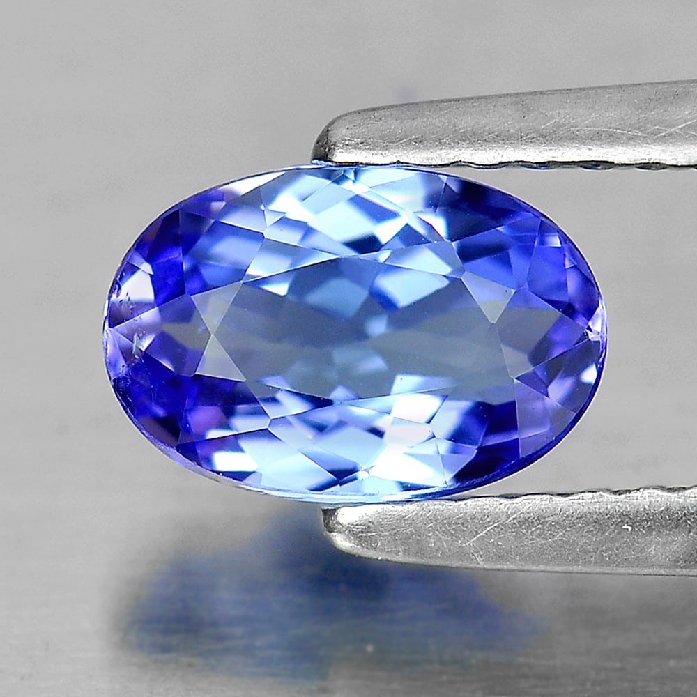Natural Violetish Blue Tanzanite Gemstones 1.07 Ct. Clean Oval Shape 7.79 x 5.23 Mm.: Product ID: 807005208 Product Name: Natural Tanzanite Weight: 1.07 CT. Size: 7.79 x 5.23 x 3.44 MM. Shape: Oval Color: Purple Clarity:IF Luster: Very Good Gems Origin: Tanzania Treatment: Heated Cryst