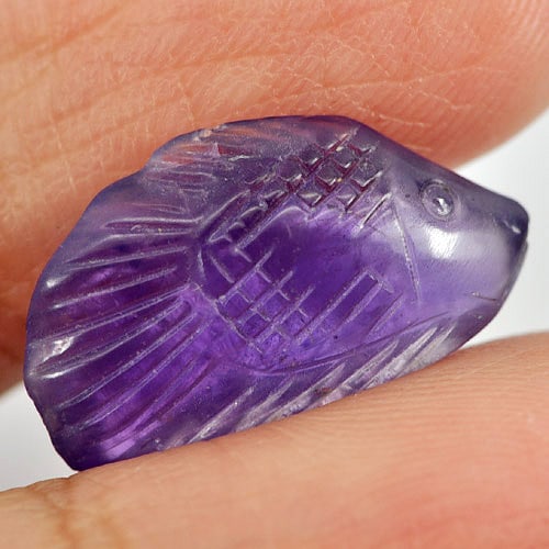 Natural Violet Amethyst Gemstones 6.57 Ct. Fish Carving Shape 18.4 x 10.2 Mm.: Product ID: 810303289 Product Name: Natural Amethyst Weight: 6.57 CT. Size: 18.4 x 10.2 x 6.1 MM. Shape: Fish Carving Color: Violet Clarity:Semi - Transparent Luster: Good Gems Origin: Brazil Treatmen