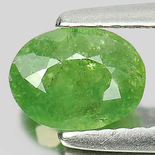 Natural Green Demantoid Garnet Gemstones 1.03 Ct. Oval Shape 6.3 x 5.4 Mm.: Product ID: 802919327 Product Name: Natural Demantoid Weight: 1.03 CT. Size: 6.3 x 5.4 x 3.5 MM. Shape: Oval Color: Green Clarity:SI Luster: Good Gems Origin: Madagascar , Africa Treatment: Unheated C