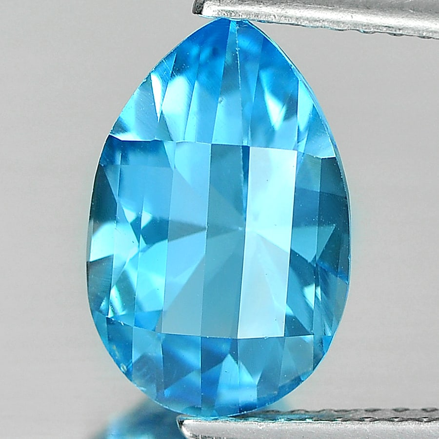 Natural Swiss Blue Topaz Gemstones 3.22 Ct. Pear Shape 11.8 x 7.7 Mm.: Product ID: 807166005 Product Name: Natural Blue Topaz Weight: 3.22 CT. Size: 11.8 x 7.7 x 5.5 MM. Shape: Pear Color: Blue Clarity:IF Luster: Good Gems Origin: Brazil Treatment: Treated Crystal Struct