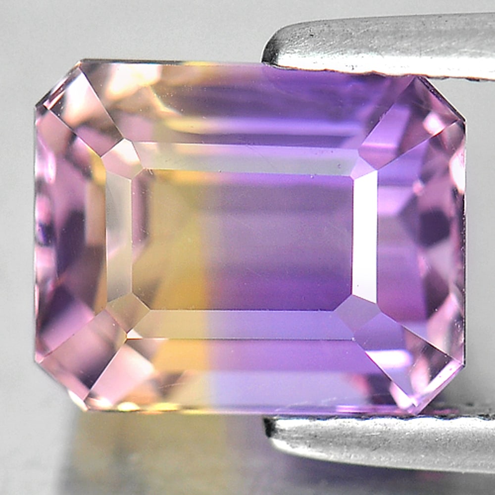 Natural Bi Color Ametrine Gemstones 3.15 Ct. Octagon Shape 9.1 x 7.5 Mm.: Product ID: 800405222 Product Name: Natural Ametrine Weight: 3.15 CT. Size: 9.1 x 7.5 x 6.7 MM. Shape: Octagon Color: Bi Color Clarity:VSI Luster: Good Gems Origin: Bolivia Treatment: Unheated Crystal