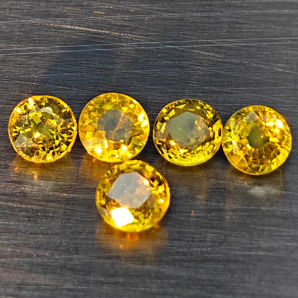 Natural Greenish Yellow Titanium Sphene Gemstones Rainbow Spark 1.59 Ct. 5 Pcs. Round Shape 3.8 Mm.: Product ID: 806509413 Product Name: Natural Sphene Weight: 1.59 CT. Size: 3.8 x 3.8 x 3.3 MM. Shape: Round Color: Greenish Yellow Titanium Rainbow Spark Clarity:SI1 Luster: Good Gems Origin: Madagasca
