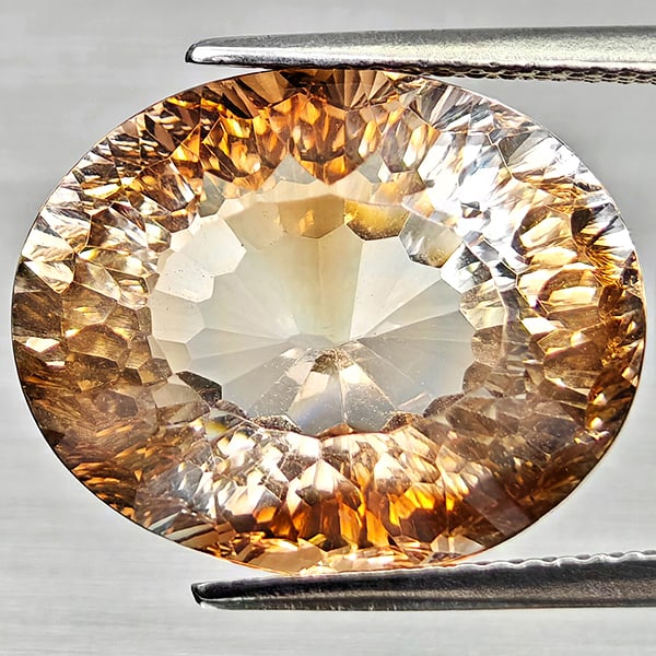 Natural Imperial Topaz Gemstones 14.75 Ct. Oval Concave Cut 13.2 x 16.3 Mm.: Product ID: 807168260 Product Name: Natural Topaz Weight: 14.75 CT. Size: 13.2 x 16.3 x 9.4 MM. Shape: Oval Concave Cut Color: Imperial Clarity:VSI Luster: Very Good Gems Origin: Brazil Treatment: Tre