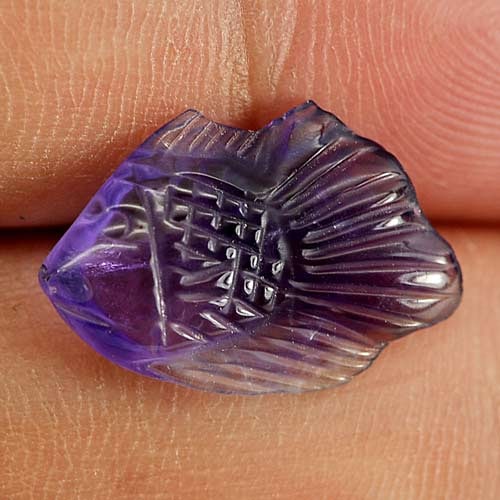 Natural Purple Amethyst Gemstones 3.70 Ct. Fish Carving 16.6 x 11.1 Mm.: Product ID: 810303677 Product Name: Natural Amethyst Weight: 3.70 CT. Size: 16.6 x 11.1 x 4.1 MM. Shape: Fish Carving Color: Purple Clarity:Semi - Transparent Luster: Good Gems Origin: Brazil Treatmen