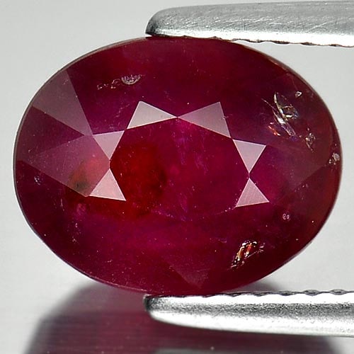Natural Purplish Red Ruby Gemstones 4.41 Ct. Oval Shape 10.4 x 8.2 Mm.: Product ID: 805928205 Product Name: Natural Ruby Weight: 4.41 CT. Size: 10.4 x 8.2 x 5.1 MM. Shape: Oval Color: Purplish Red Clarity:SI Luster: Good Gems Origin: Madagascar Treatment: Heated (Lead-gla