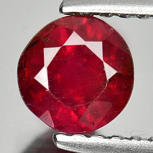 Natural Red Ruby Gemstones 0.92 Ct. Round Shape 5.2 Mm.: Product ID: 805933655 Product Name: Natural Ruby Weight: 0.92 CT. Size: 5.2 x 5.2 x 3.2 MM. Shape: Round Color: Red Clarity:SI1 Luster: Good Gems Origin: Madagascar Treatment: Heated (Lead-glass filli