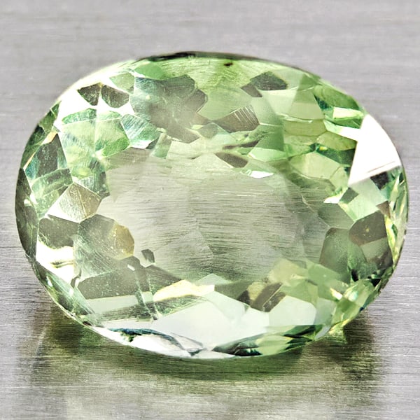 Natural Light Green Aquamarine Gemstones 1.55 Ct. Oval Shape 8.3 x 6.5 Mm.: Product ID: 800812100 Product Name: Natural Aquamarine Weight: 1.55 CT. Size: 8.3 x 6.5 x 5.1 MM. Shape: Oval Shape Color: Light Green Clarity:VSI - SI1 Luster: Good Gems Origin: Brazil Treatment: Unh