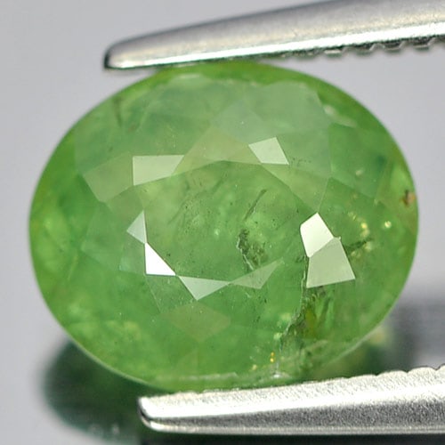 Natural Green Demantoid Garnet Gemstones 2.04 Ct. Oval Shape 8 x 6.7 Mm.: Product ID: 802919210 Product Name: Natural Demantoid Weight: 2.04 CT. Size: 8 x 6.7 x 4.4 MM. Shape: Oval Color: Green Clarity:SI Luster: Good Gems Origin: Madagascar , Africa Treatment: Unheated Cry