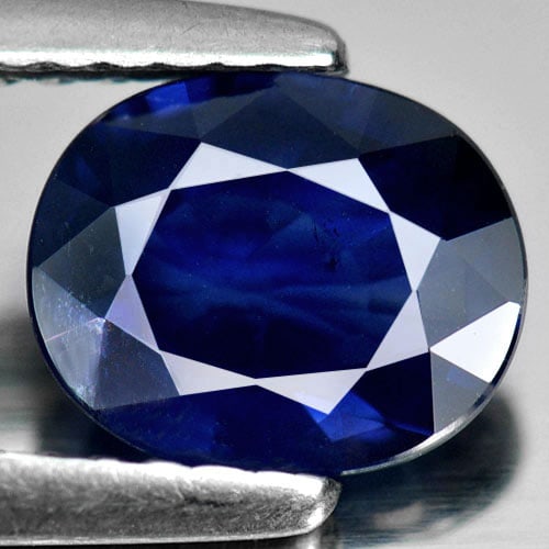 Natural Blue Sapphire Gemstones 1.36 Ct. Oval Shape 7.5 x 6.1 Mm.: Product ID: 806008207 Product Name: Natural Blue Sapphire Weight: 1.36 CT. Size: 7.5 x 6.1 x 3.2 MM. Shape: Oval Color: Blue Clarity:VSI Luster: Good Gems Origin: Thailand Treatment: Heated Crystal St