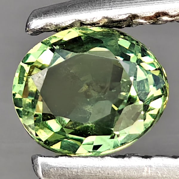 Natural Green Songea Sapphire Gemstones 0.46 Ct. Oval Shape 4.7 x 4.2 Mm.: Product ID: 806163009 Product Name: Natural Green Sapphire Weight: 0.46 CT. Size: 4.7 x 4.2 x 2.6 MM. Shape: Oval Shape Color: Green Clarity:VSI Luster: Good Gems Origin: Tanzania Treatment: Heated Cr
