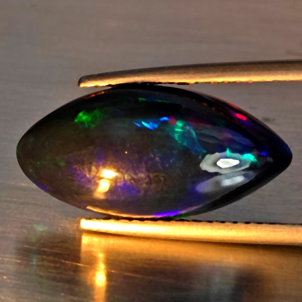 Natural Multi Color Play Of Colour Opal Gemstones 4.40 Ct. Marquise Cabochon Shape 19.2 x 9.4 Mm.: Product ID: 818728550 Product Name: Natural Opal Weight: 4.40 CT. Size: 19.2 x 9.4 x 6.1 MM. Shape: Marquise Cabochon Shape Color: Multi-Color Clarity:Semi - Transparent Luster: Good Gems Origin: Ethi
