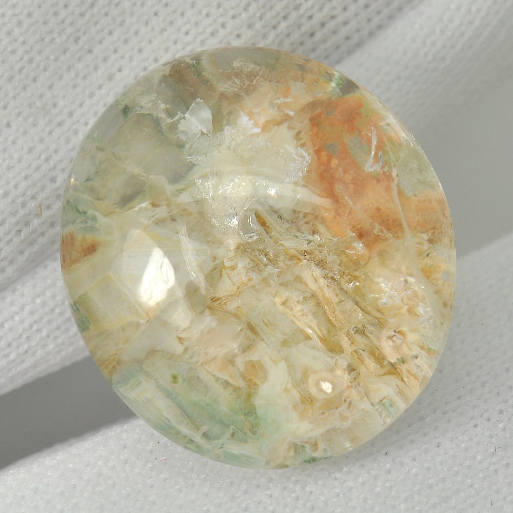 Natural White Quartz Gemstones 24.33 Ct. Oval Cabochon Shape 19.6 x 17.6 Mm.: Product ID: 805529478 Product Name: Natural Quartz Weight: 24.33 CT. Size: 19.6 x 17.6 x 10.1 MM. Shape: Oval Cabochon Color: White Clarity:Semi - Transparent Luster: Good Gems Origin: Thailand Treatm