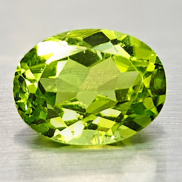 Natural Green Peridot Gemstones 2.19 Ct. Oval Shape 7 x 9 Mm.: Product ID: 805316926 Product Name: Natural Peridot Weight: 2.19 CT. Size: 7 x 9 x 4.7 MM. Shape: Oval Color: Green Clarity:VSI Luster: Good Gems Origin: Pakistan Treatment: Unheated Crystal Structure