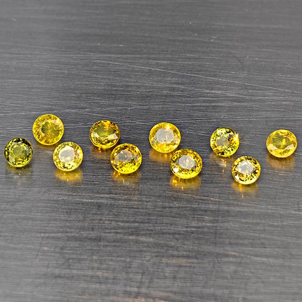 Natural Greenish Yellow Titanium Sphene Gemstones Rainbow Spark 1.60 Ct.10 Pcs. Round Shape 3.2 Mm.: Product ID: 806509395 Product Name: Natural Sphene Weight: 1.60 CT. Size: 3.2 x 3.2 x 1.9 MM. Shape: Round Color: Greenish Yellow Titanium Rainbow Spark Clarity:SI1 Luster: Good Gems Origin: Madagasca