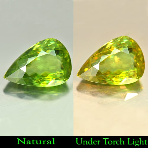 Natural Yellowish Green Titanium Sphene Gemstones Rainbow Spark 10.88 Ct. Pear Shape 16.64 x 11.57: Product ID: 806503835 Product Name: Natural Sphene Weight: 10.88 CT. Size: 16.64 x 11.57 x 7.51 MM. Shape: Pear Color: Yellowish Green With Rainbow Spark Clarity:VSI Luster: Adamantine Gems Origin: Ma